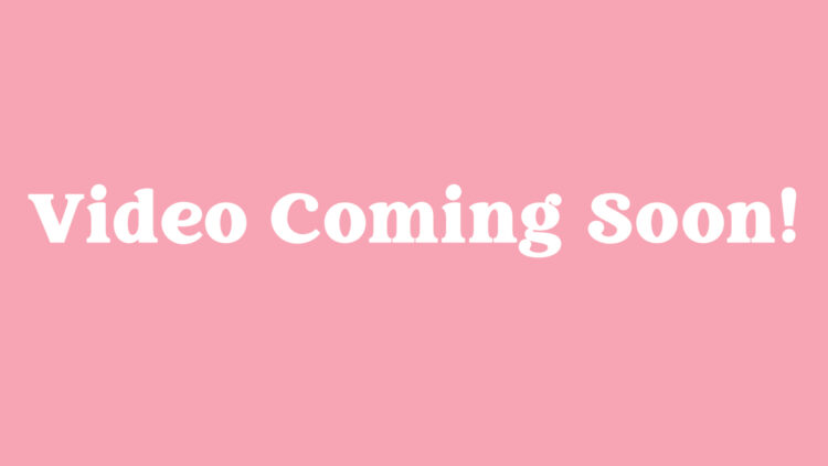 White "Video Coming Soon!" text on dark coral colored background